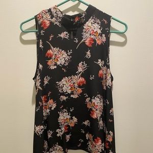Anthropology sleeveless black floral top.